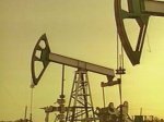 Нефть слабо дешевеет на прогнозах МЭА по снижению спроса