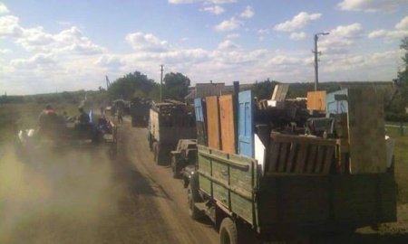 Украинские силовики вывозят награбленное у населения грузовиками