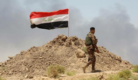 Иракские военные освободили от террористов район Акашат на границе с Сирией