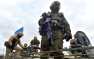 В Киеве вводят спецпропуска, а улицы будут патрулировать военные (ВИДЕО)